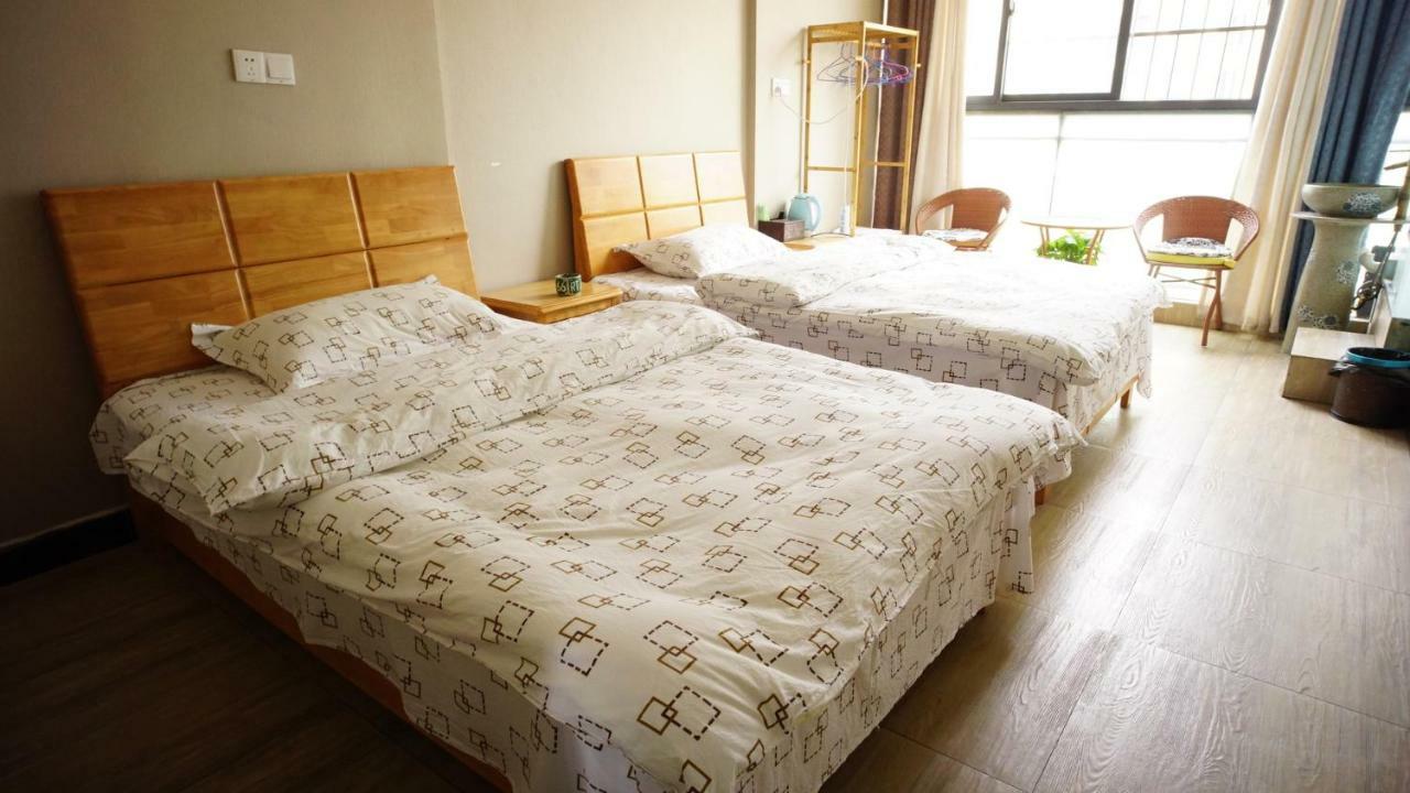Huanlesong Youth Hostel Wuhan Camera foto