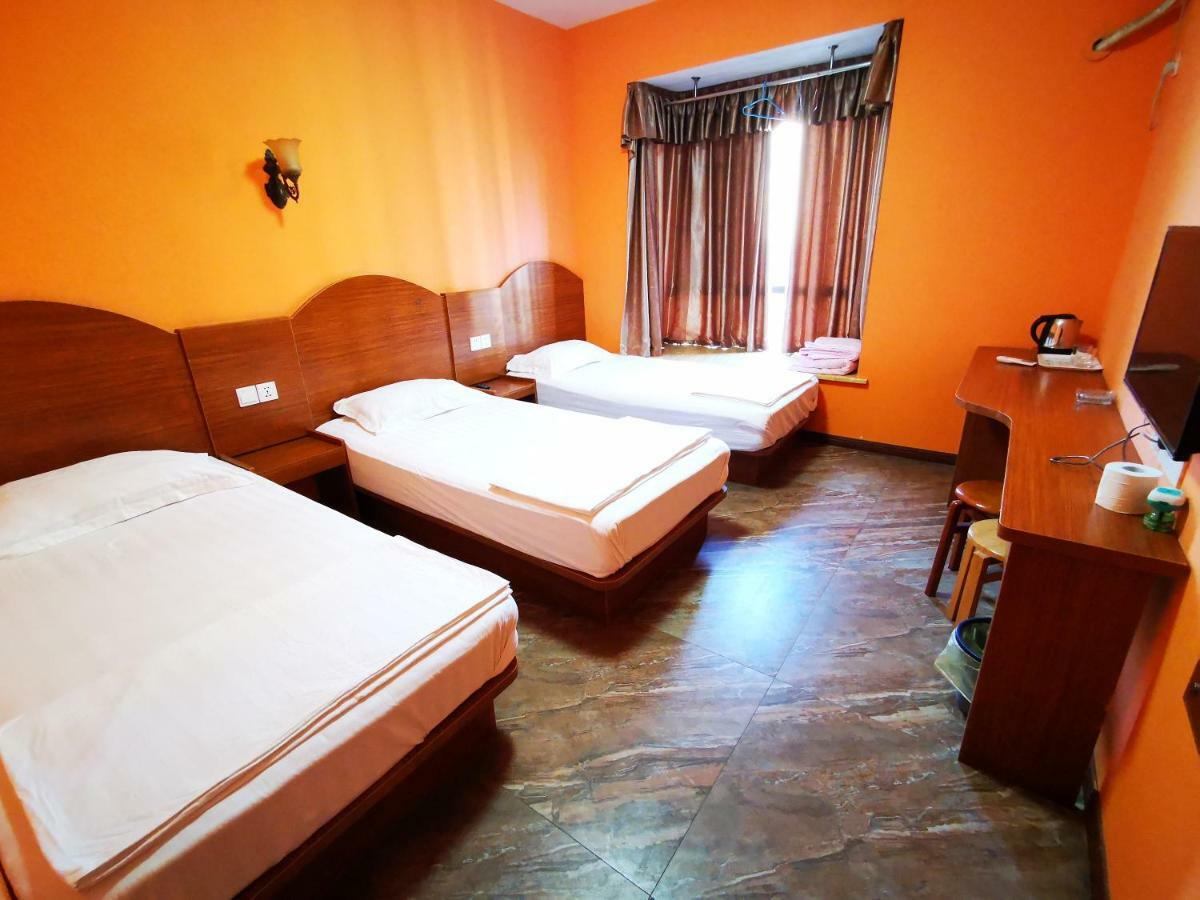 Huanlesong Youth Hostel Wuhan Esterno foto