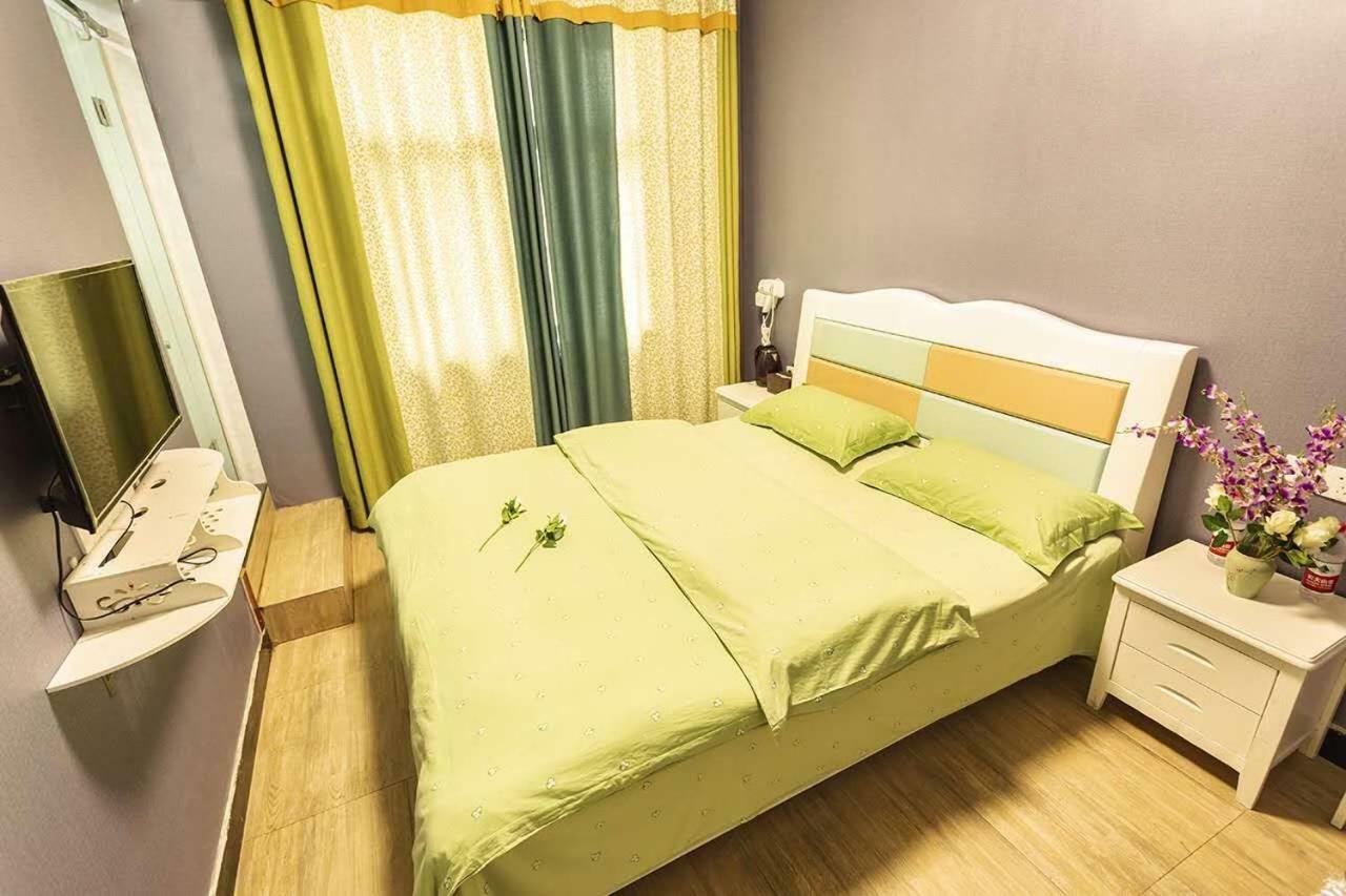 Huanlesong Youth Hostel Wuhan Esterno foto